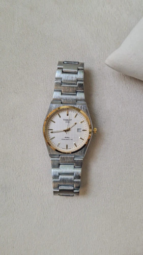 ساعت پسرانه تیسوت سیلور طلایی صفحه سفید کد 1601